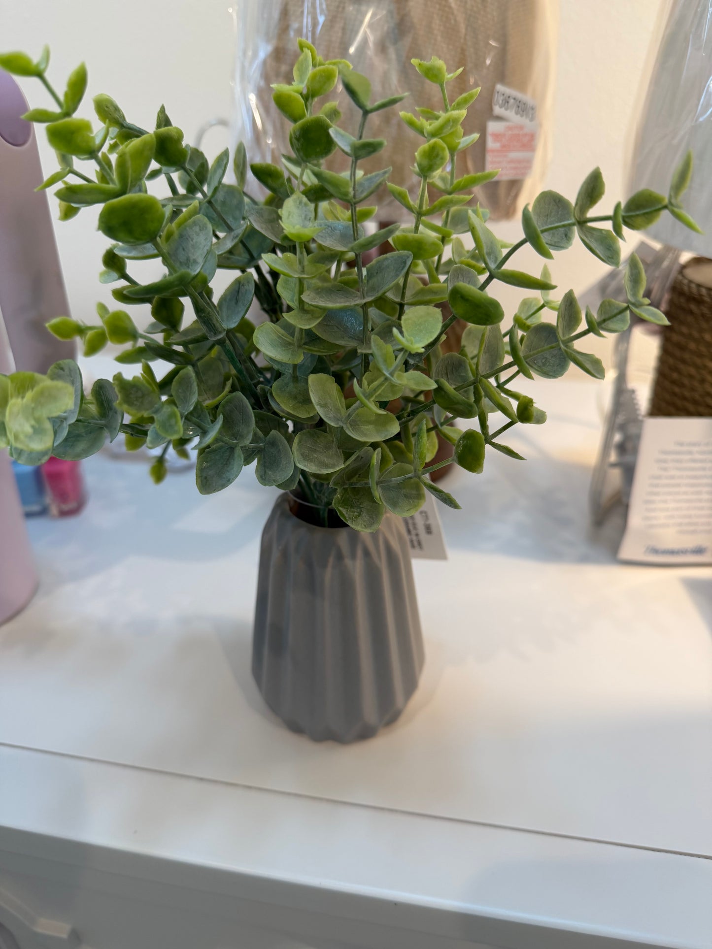 Artificial Plant: Small greenery in gray vase